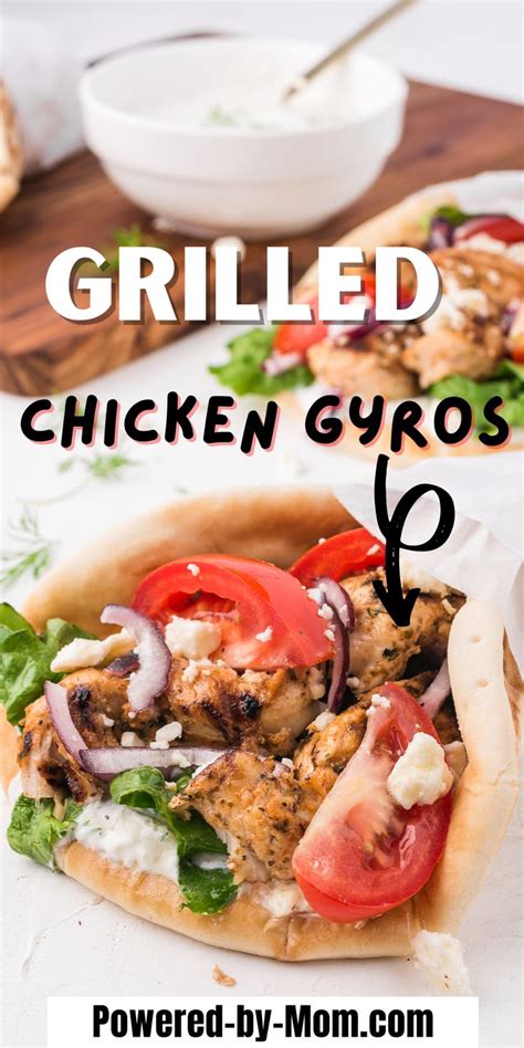 grilled chicken gyros on pita bread with tomatoes, onions and lettuce