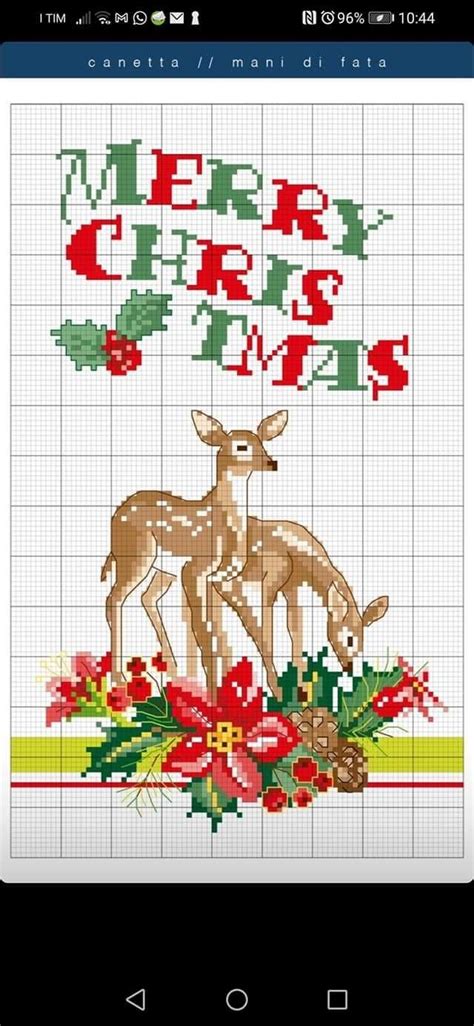 A Cross Stitch Pattern With The Words Merry Christmas And Two Deers In