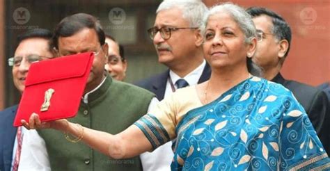 Sitharaman Takes Tablet Wrapped In A Bahi Khata Style Pouch To