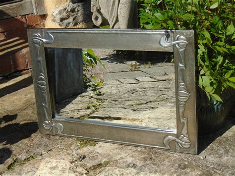 Antiques Atlas Arts Crafts Pewter Mirror With Raised Decoration