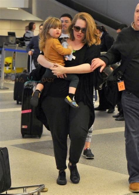 Singer-Adele-and-her-son-Angelo-Konecki-arriving-on-a-flight-at-LAX-536x750