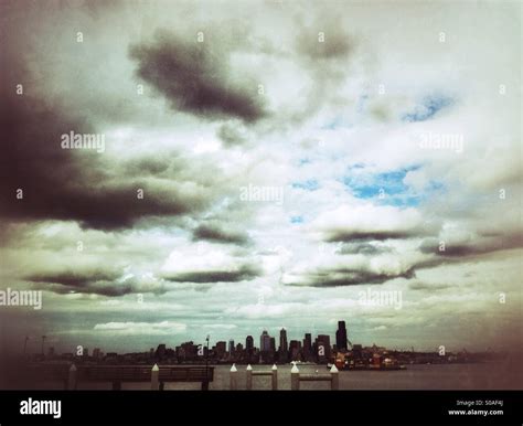 Cloudy sky over Seattle skyline Stock Photo - Alamy