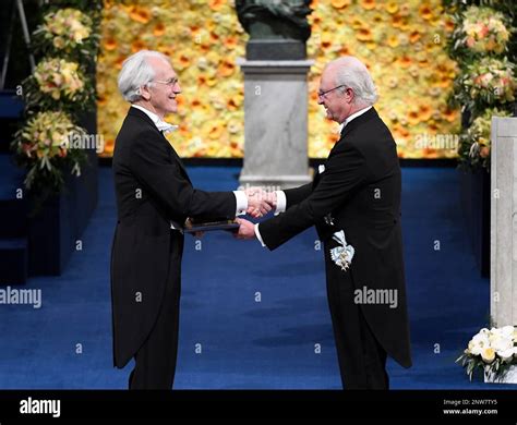 Physics Laureate Gerard Mourou Left Receives The Prize From King Carl