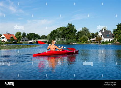 Woman In Bikini In Kayak Hi Res Stock Photography And Images Alamy