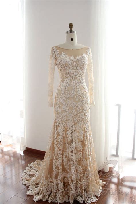 Elegant Ivory Nude Lace Wedding Dress With Sheer Neckline And Low Open Back