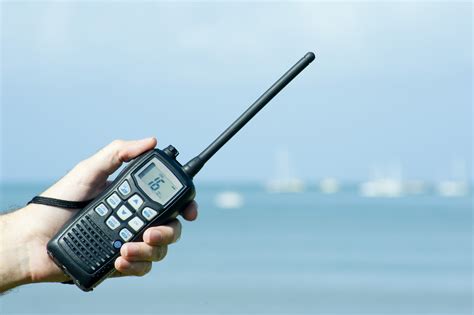 Hand holding a hand-held radio-8166 | Stockarch Free Stock Photos