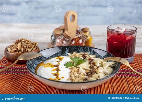 Turkish Cuisine, Samsun Style Ravioli. Turkish Ravioli Manti Preparation with Meat, Yoghurt ...