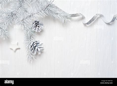 Mockup Christmas Tree Cone And Silver Ribbon Flatlay On A White Wooden