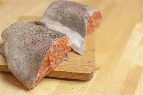 Pieces Of Fresh Trout Fish On A Wooden Surface Stock Image Image Of