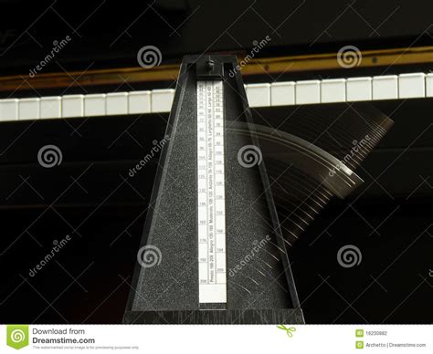 Metronome on the piano stock photo. Image of play, andante - 16230882