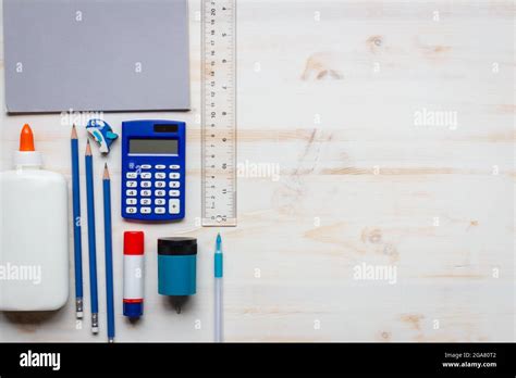 border of school supplies on white wood background with copy space Stock Photo - Alamy