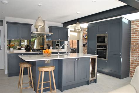 A Modern Kitchen With Slate Blue Cabinets Kitchen Cabinets