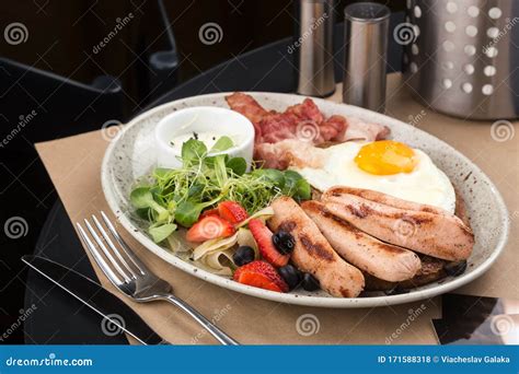 American Breakfast With Sunny Side Up Fried Egg Toast Sausage Stock