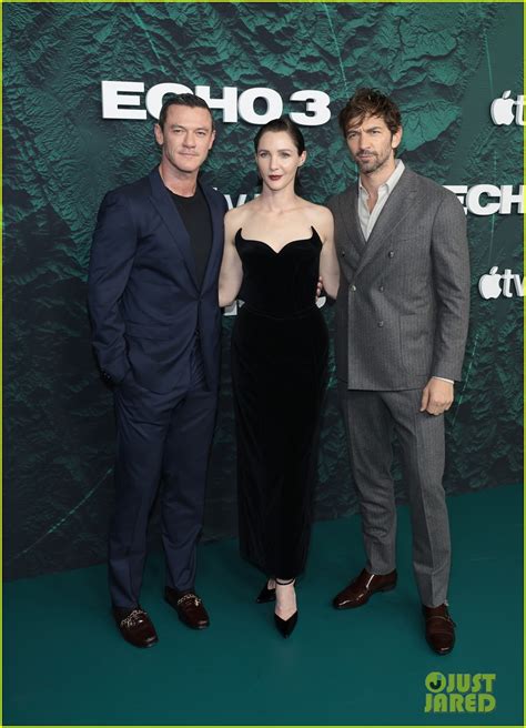 Luke Evans Fixes Michiel Huisman S Shirt At Echo Series Premiere