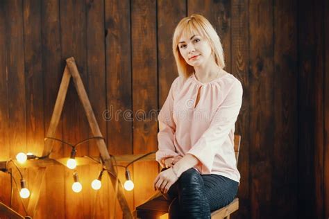 Blonde Girl Sitting On A Chair Stock Image Image Of Necklace Cute 105029479