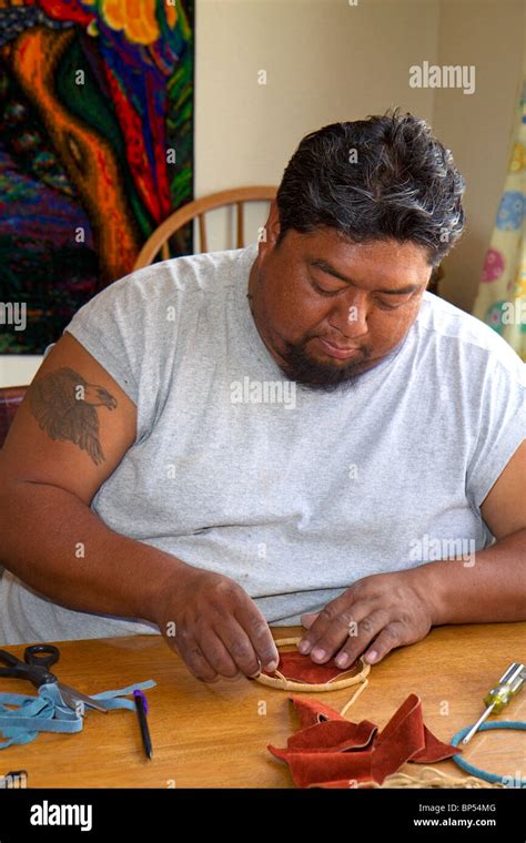 Native Pueblo Man Crafting A Dreamcatcher In San Felipe Pueblo New