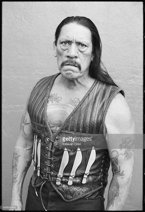 Actor Danny Trejo Poses For The Machete Movie Premiere In An Alley