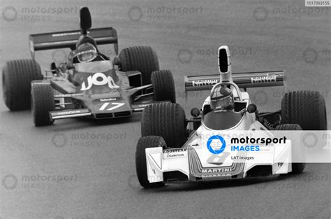 Carlos Pace Brabham BT44B Ford Leads Jean Pierre Jarier Shadow DN5