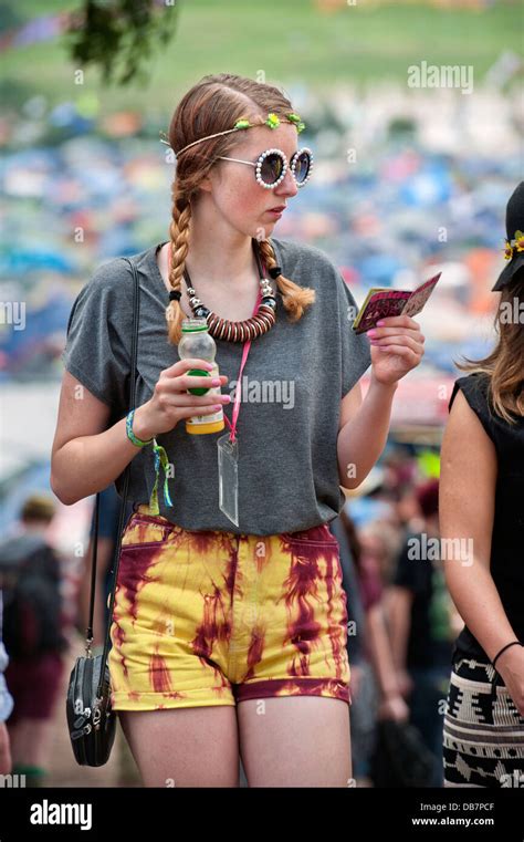 Glastonbury Festival 2013 Uk A Young Music Fan Checks The Festival