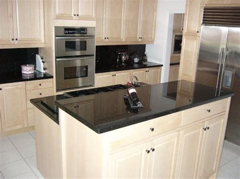 Black Granite Countertops With Cream Cabinets – Countertops Ideas