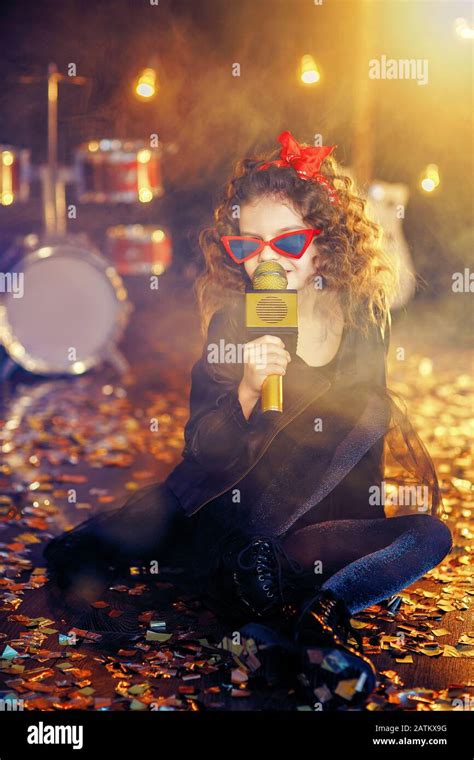 Beautiful Girl With Curly Hair Wearing Leather Jacket Red Sunglasses