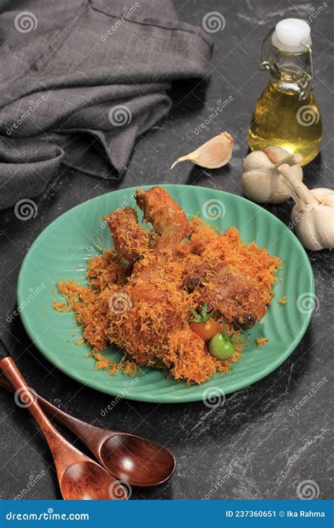 Ayam Serundeng, Fried Chicken with Shredded Coconut Stock Image - Image of plate, vegetable ...