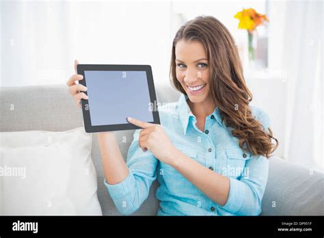 Attractive Brunette Showing Her Tablet Screen Stock Photo Alamy