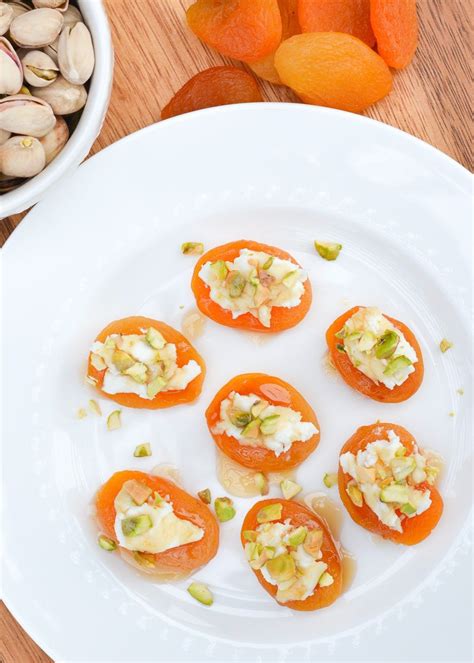 Dried Apricots Are Topped With Creamy Goat Cheese Crunchy Pistachios