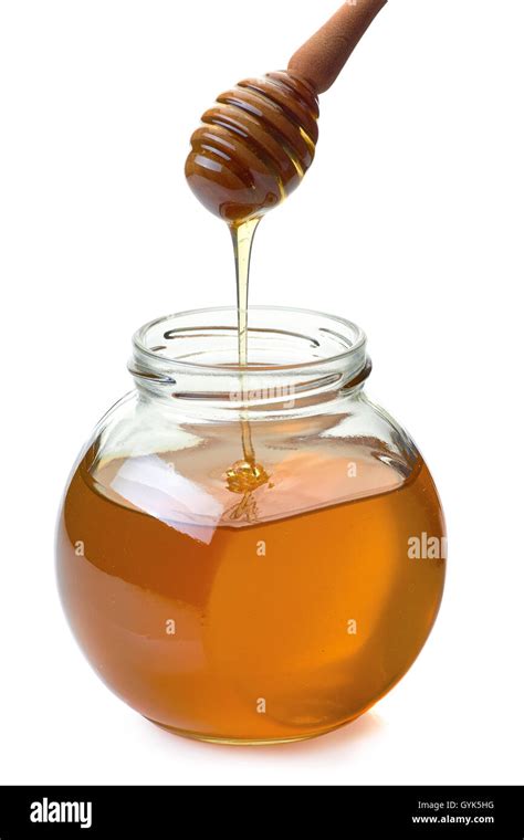 Jar With Dripper An Flowing Honey On White Stock Photo Alamy