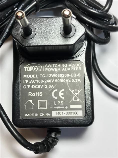 EU OMRON AC/DC Adapter Model 6V06ASW-UK 100-240V 50/60Hz 15VA 6V 600mA