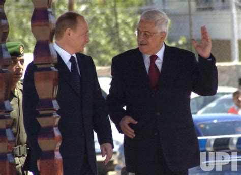 Photo PALESTINIAN PRESIDENT MAHMOUD ABBAS GREETS RUSSIAN PRESIDENT