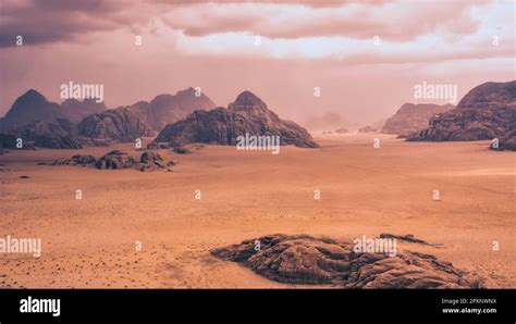 Storm And Rain Clouds Over The Desert Landscape Of Wadi Rum In Jordan