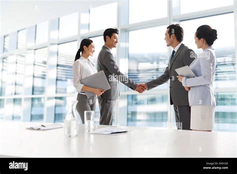 Business people shake hands Stock Photo - Alamy