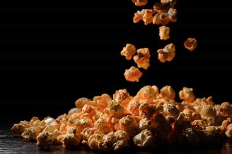 Popcorn Popping In Slow Motion Stock Photos, Pictures & Royalty-Free Images - iStock