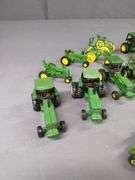 LOT OF MISC JOHN DEERE MINIATURE TRACTORS AND ATTACHMENTS EK