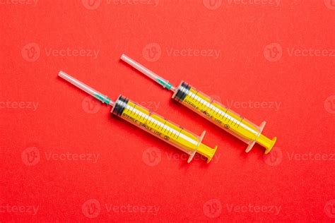 Top View Of Medical Syringes On Colorful Background With Copy Space