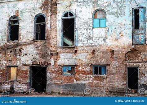 Old Destroyed Brick Building With Broken Windows And No Doors Stock