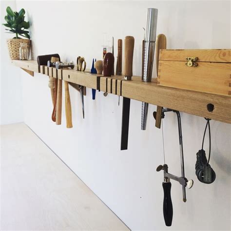 There Are Many Different Tools Hanging On The Wall