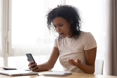 Unhappy African American Woman Reading Bad News Problem With Phone