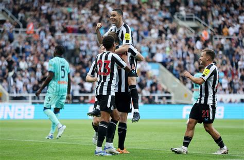 Download Jubilant Newcastle United Fc Players Celebrating A Victory