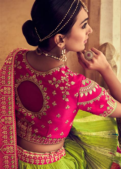 Woven Zari Banarasi Silk Lehenga Choli In Green And Pink