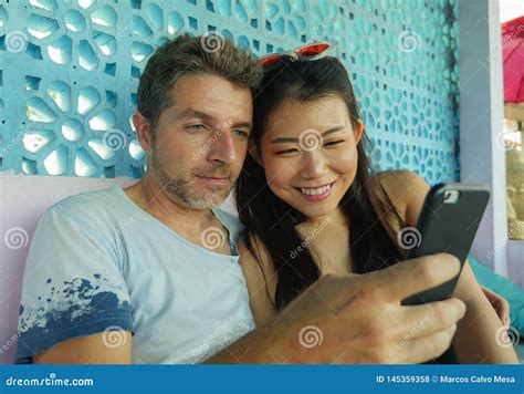 Happy Mixed Ethnicity Couple In Love Smiling Cheerful With Handsome