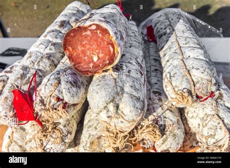 Traditional Dry Cured Pork Sausages On French Market Stall La Roche