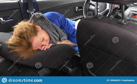 The Driver Of The Woman Fell Asleep On The Driver`s Seat On The Side Of