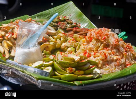 Delicious traditional Khmer street food is for sale on a city street in ...