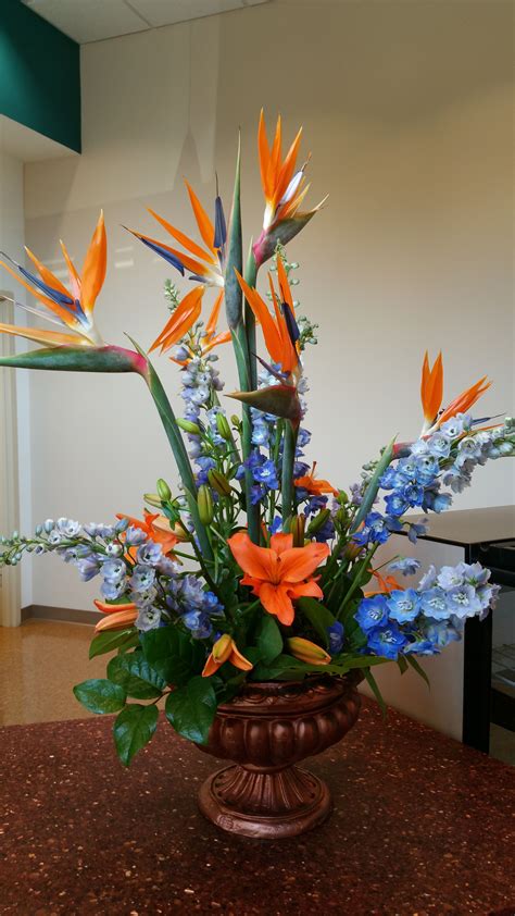 A unique tropical arrangement. Flowers by Victoria Floral Designs