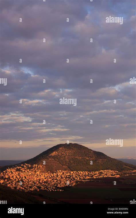 Israel Lower Galilee A View Of Mount Tabor And Arab Village Daburiya