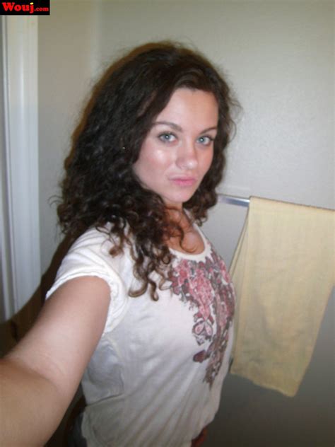 Hot Brunette Chick Taking Pictures Of Her Nice Body 15 Photos