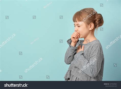 Little Girl Coughing On Color Background Stock Photo 1077047831 ...