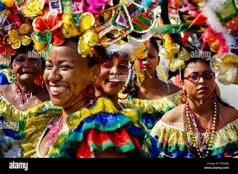 Colombian Women Wearing A Colorful Costumes Dances During The